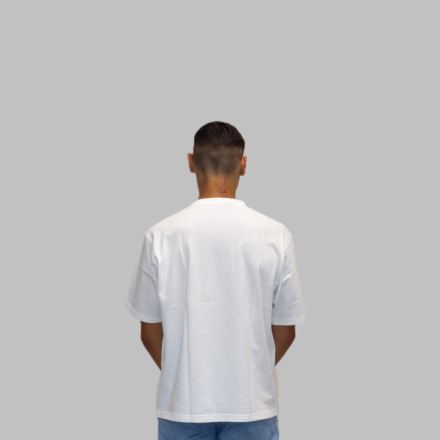 T-shirt a maniche corte bianca con stampa